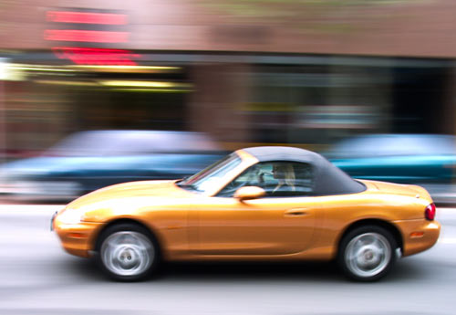 Using a slower shutter speed to capture motion blur