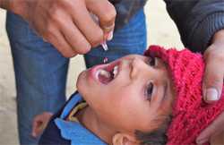 Child getting polio drops, Nepal 2011