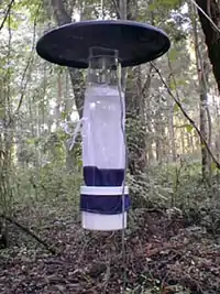 A carbon dioxide-baited CDC light trap at NPSmonitoring site: The highest individual light trap total for 2010 was from a trap located in a salt marsh in the Fire Island National Seashore: around 25,142 mosquitoes were collected during a 16-hour period on August 31.