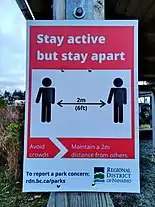 A sign encouraging social distancing in Nanaimo, British Columbia