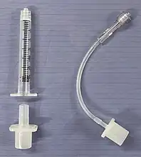Comparison of the two connector methods, with the intravenous tubing and a 2.5 endotracheal tube adapter on the right