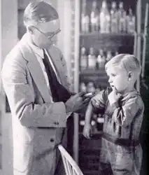 Child receiving rabies innoculation (1929)