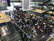 people in line for mass vaccination event at Manukau Institute of Technology