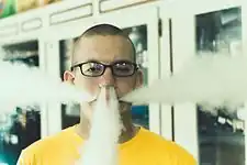 Vaping trick known as the dragon.