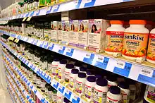 Rows and rows of pill bottles on shelves