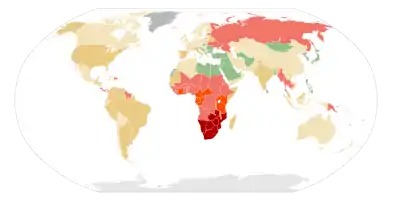  A map of the world where most of the land is colored green or yellow except for sub Saharan Africa which is colored red