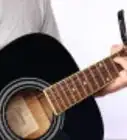 Capo a Fret on an Acoustic Guitar