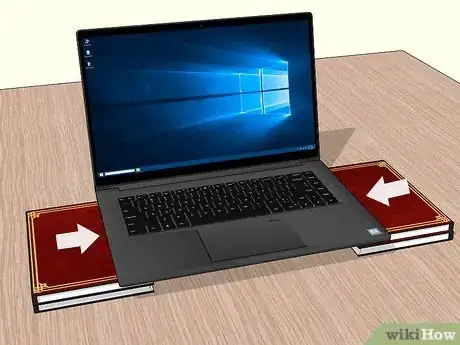 Image titled Raise a Laptop on a Desk Step 1