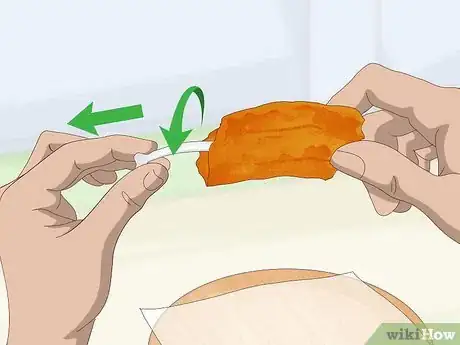 Image titled Eat Chicken Wings Step 6
