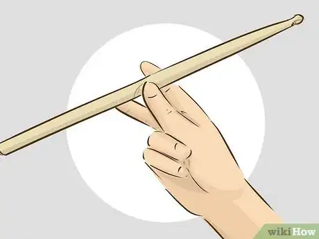 Image titled Twirl a Drumstick Step 8