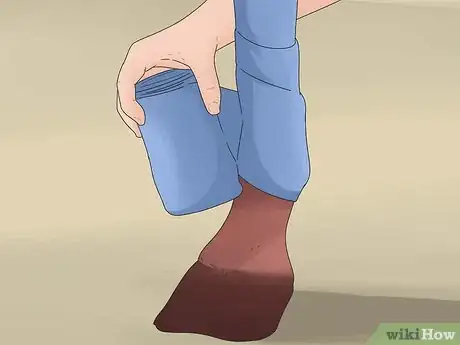 Image titled Wrap a Horse's Leg Step 26