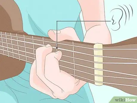 Image titled Reduce Guitar String Noise Step 1