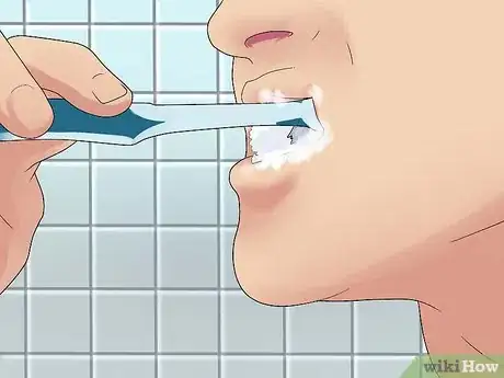 Image titled Brush Your Teeth With Braces On Step 4