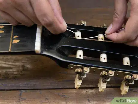 Image titled Change Strings on an Acoustic Guitar Step 12