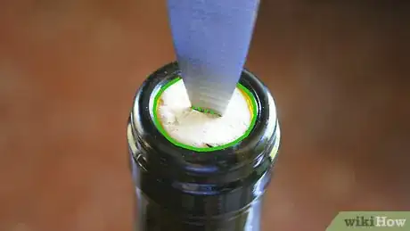 Image titled Open a Wine Bottle Without a Corkscrew Step 6