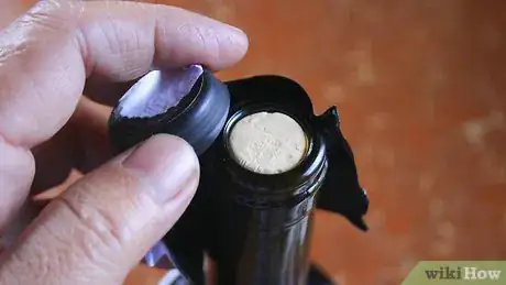 Image titled Open a Wine Bottle Without a Corkscrew Step 9