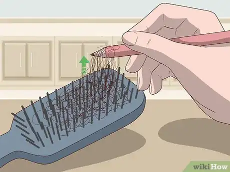 Image titled Clean a Paddle Brush Step 2.jpeg