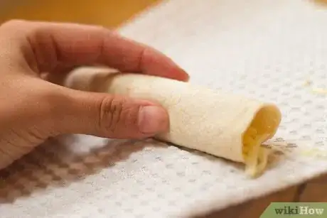 Image titled Make a Tortilla Cheese Roll Up Step 4