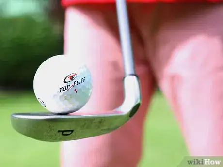 Image titled Juggle a Golf Ball on a Golf Club Step 5
