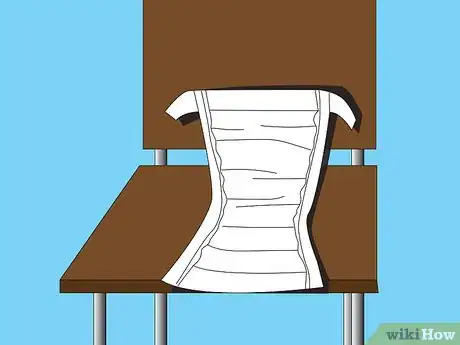 Image titled Change a Disposable Adult Diaper While Sitting Step 6