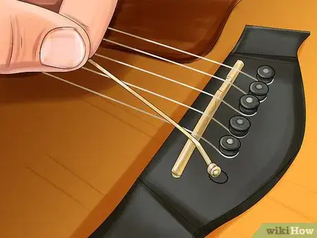 Image titled Lower the Action on an Acoustic Guitar Step 3