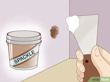 Image titled Repair Holes in Drywall With Spackle Step 1.jpeg