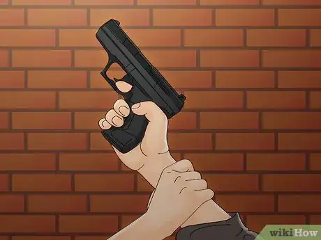Image titled Disarm a Criminal with a Handgun Step 2