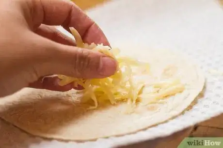 Image titled Make a Tortilla Cheese Roll Up Step 3