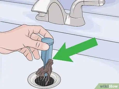 Image titled Clean a Bathroom Sink Drain Step 1