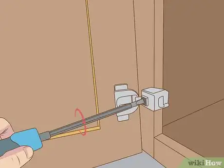 Image titled Clean Cabinet Hinges Step 3