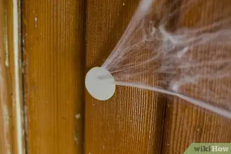 Image titled Put Up Fake Spider Webs Step 5