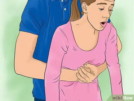 Image titled Perform the Heimlich Maneuver Step 3