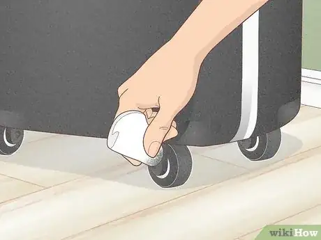 Image titled Replace Luggage Wheels Step 1