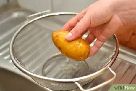 Image titled Peel Potatoes With an Ordinary Kitchen Knife Step 3