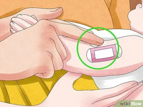 Image titled Remove a Bandage from a Baby Step 3