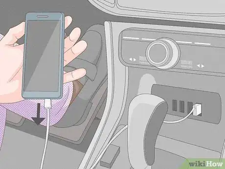 Image titled Respond When Your Car's Battery Light Goes On Step 1