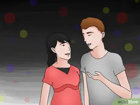 Image titled Dance with a Girl to Attract Her (in a Club) Step 1
