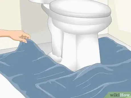 Image titled Unclog a Toilet from a Flushed Toilet Paper Roll Step 2