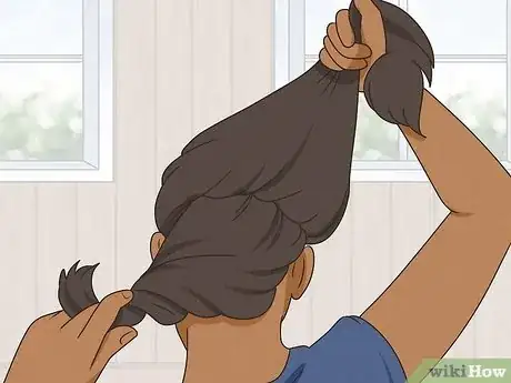 Image titled Curl Hair Using a Hot Air Brush Step 15.jpeg