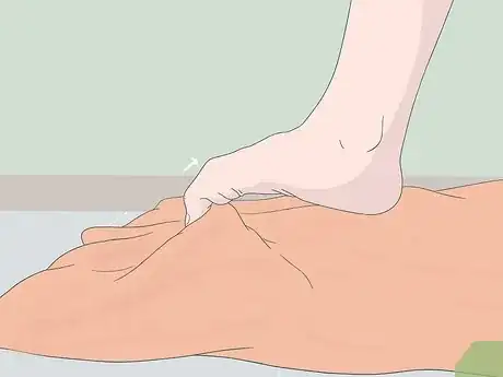 Image titled Stretch the Arch of Your Foot Step 10