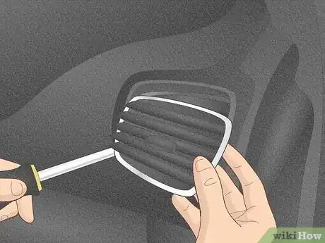 Image titled Retrieve Something from Car Vent Step 1