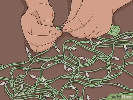 Image titled Fix Christmas Lights That Are Half Out Step 02