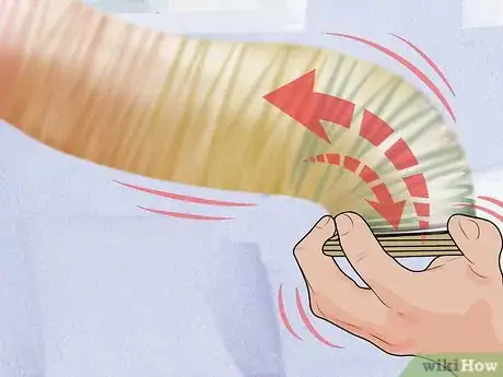 Image titled Do Cool Tricks With a Slinky Step 5