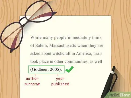 Image titled A sample in-text APA citation showing the author's name and year published.