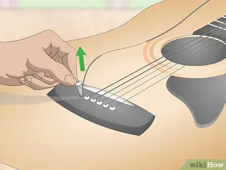 Image titled Fix Guitar Strings Step 2