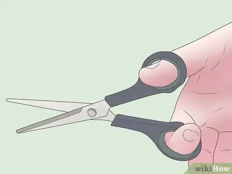 Image titled Carry Scissors Step 3