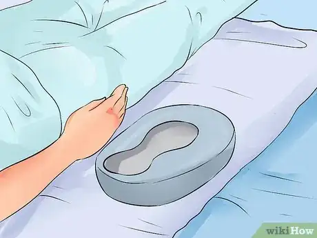 Image titled Position a Bedpan Step 11