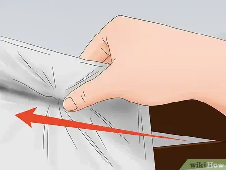 Image titled Clean a Ceiling Fan with a Pillowcase Step 10