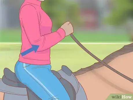 Image titled Control and Steer a Horse Using Your Seat and Legs Step 14