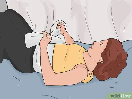 Image titled Stretch Your Lower Back While Lying Down Step 12